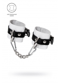 Бело-черные кожаные наручники с одним ремешком с люверсами - Pecado - купить с доставкой в Новокуйбышевске
